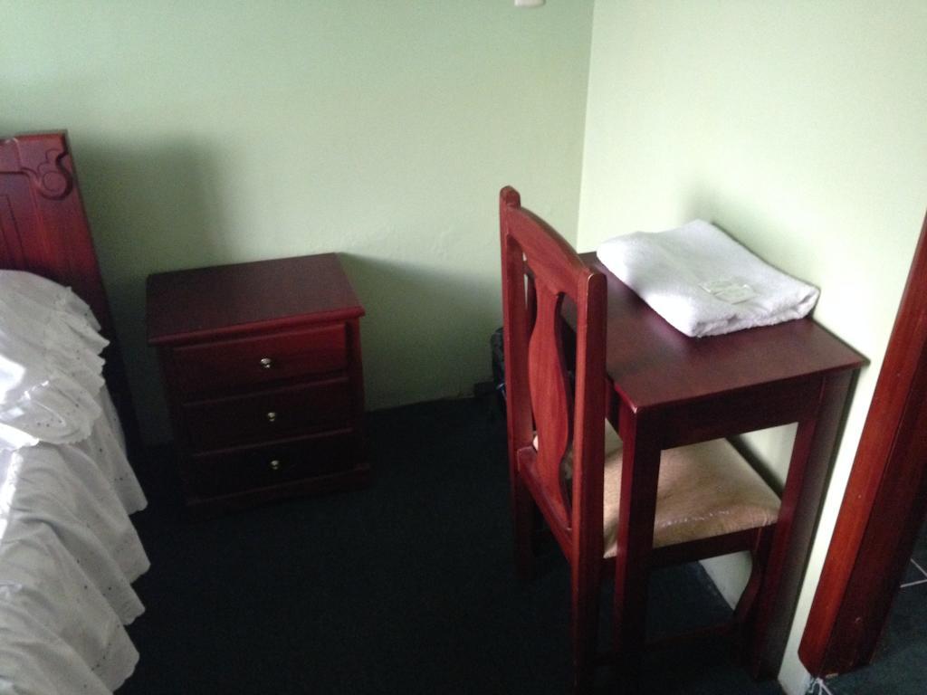 Hostal Los Lirios Loja Quarto foto